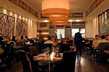 The interior is warm and cozy Argentine rustic. (Courtesy of Esther Montero) The interior is warm and cozy Argentine rustic. (Courtesy of Esther Montero)