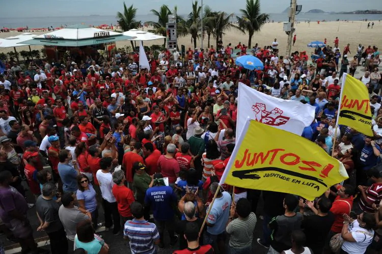 Firemen and police officers demonstrate over pay at Copacabana beach in Rio de Janeiro, on February 12. The strike was called off on Monday to not disrupt Carnival.  (Christophe Simon/AFP/Getty Images)