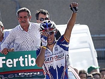 Joaquin Rodriguez of the Katusha team celebrates as he crosses the finish line Stage 14 of the 2010 Vuelta a España. (Jaime Reina/AFP/Getty Images)