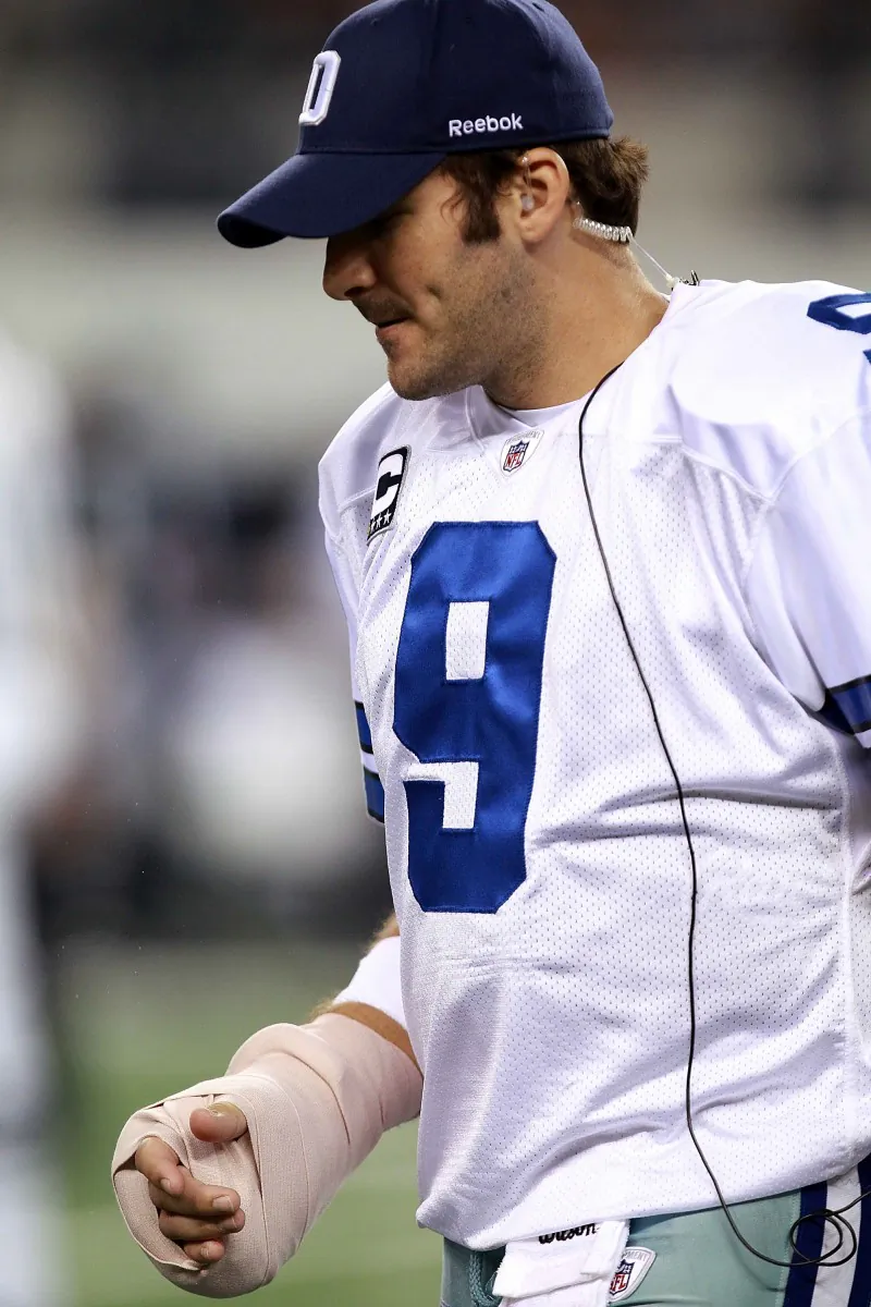 All indications are that Tony Romo will play Sunday against the Giants. (Ronald Martinez/Getty Images)