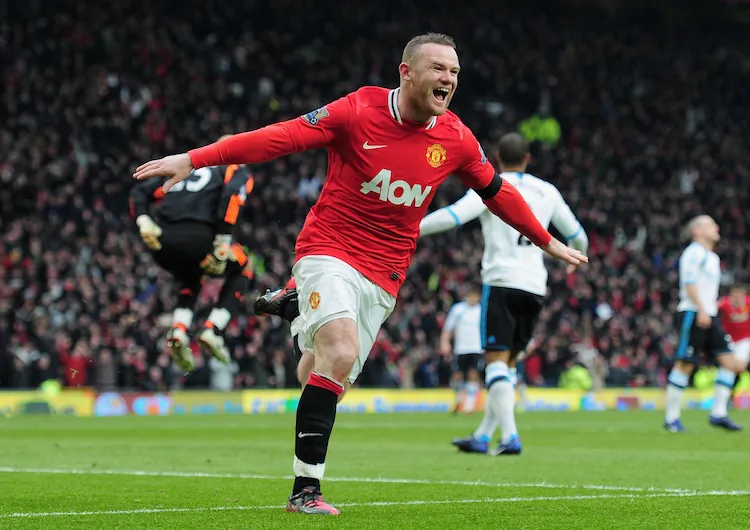 Manchester United’s Wayne Rooney was the difference-maker as the Red Devils gained a measure of revenge over Liverpool. (Shaun Botterill/Getty Images)