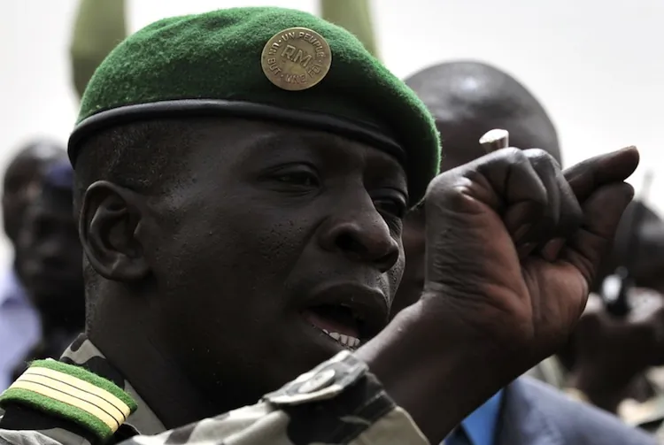 Malian military junta leader Amadou Sanogo speaks to supporters at Bamako airport on March 29 in Bamako. (Issouf Sanogo/AFP/Getty Images)