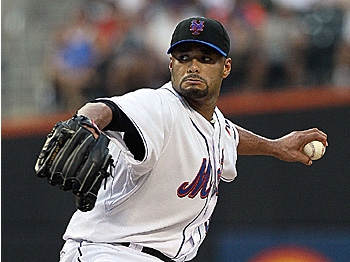 CLEANING UP: Mets ace Johan Santana pitched a flawless game against the Atlanta Braves on Sunday to help prevent a series sweep. (Jim McIsaac/Getty Images)