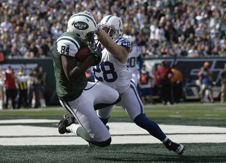 Stephen Hill (L) finds the end zone against the Colts as the Jets convert all five red-zone appearances into touchdowns Sunday. (Nick Laham/Getty Images)