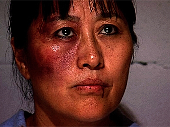 PERSECUTION: The Falun Gong practitioner, played by Lili Li, forbears through the torture. (NTD Films/Requisite Films) PERSECUTION: The Falun Gong practitioner, played by Lili Li, forbears through the torture. (NTD Films/Requisite Films)