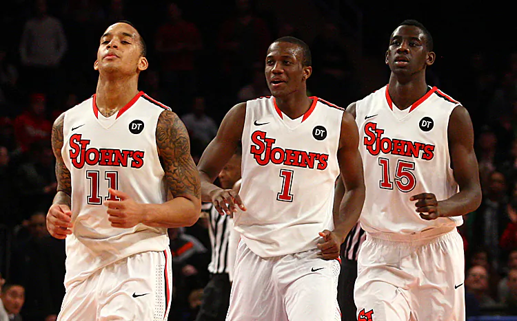 (L-R) D'Angelo Harrison No. 11, Phil Greene No. 1, and Sir'Dominic Pointer No. 15 led the Red Storm to its third straight win Saturday. (Chris Chambers/Getty Images)
