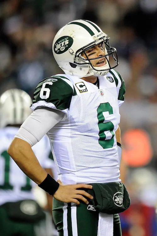 Mark Sanchez posted career bests in passing yards, TDs, and quarterback rating in 2011 but couldn't get the team to the postseason. (Patrick McDermott/Getty Images)