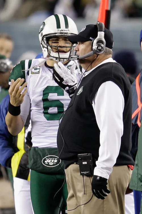 Mark Sanchez (L) has stayed as Rex Ryan's quarterback despite sub-par numbers on offense and the team's 4-7 standing this season. (Rob Carr/Getty Images)