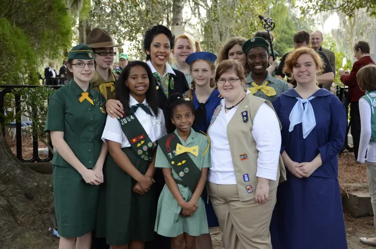 Juliette Gordon Low (C) pictured with a group of Girl Scouts. (Adrienne Kovar/Girl Scouts of the USA)