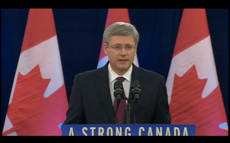 A screenshot from CBC News, taken on Dec. 7, 2012, shows Canadian Prime Minister Stephen Harper announcing that the government would allow Chinese state-owned CNOOC to take over Calgary-based Nexen Inc., while signalling Canada’s disapproval of increased takeovers by foreign state-owned enterprises in Canada's oil sands. (Screenshot/CBC News)