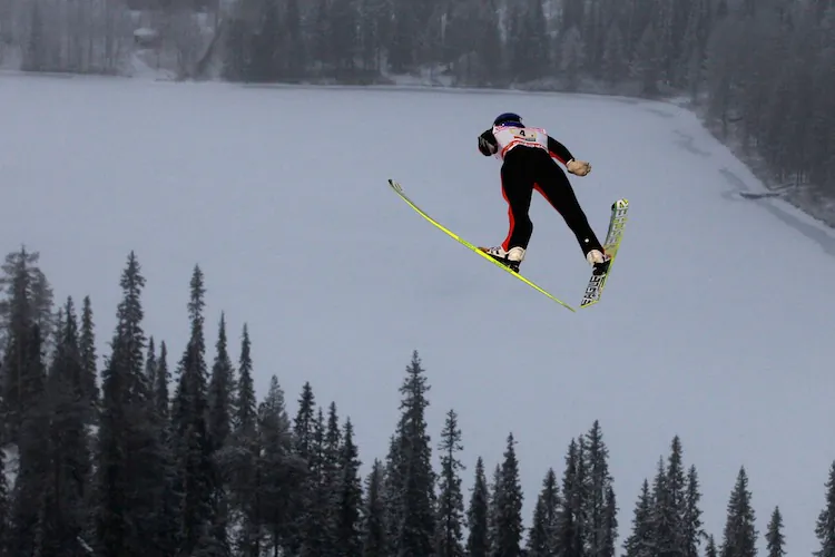 A ski jumper takes flight during the large hill team ski jumping event at the FIS World Cup Nordic Opening 2011 on Nov. 27 in Kuusamo, Finland. There was concern that ski jumping events would have to be postponed due to unseasonably warm weather in Europe, however only preseason workouts were affected. The season opening event has been held at Kuusamo since 2002, despite being a notoriously windy mountain. The wind canceled events on Saturday, but the event went on Sunday in snowy conditions. The Austrians claimed the top three spots in the individual jump and took the team gold as well. (Alexander Hassenstein/Bongarts/Getty Images)