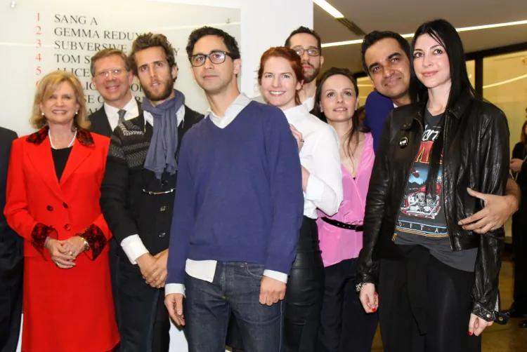 Designer Yuvi Alpert (3rd from L) and others in the fashion industry on Monday at the Fashion Incubator, along with Congress member Carolyn Maloney (L) and Parsons Executive Dean Joel Towers (second from L). (Zachary Stieber/The Epoch Times)