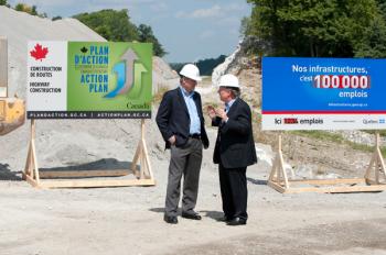 Caption: Prime Minister Stephen Harper and Quebec Premier Jean Charest at the construction site of the Highway 5 project in the Outaouais region.  (Prime Minister's Office and Transport Canada)