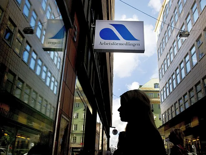 A person in front of the Swedish employment agency in Stockholm, Sweden, October 2009. Swedish youths are encouraged by employment officers to travel to neighboring Norway to do the unskilled labor that Norwegian youths don't want to do. (Bertil Ericson/ SCANPIX/AFP/Getty Images)