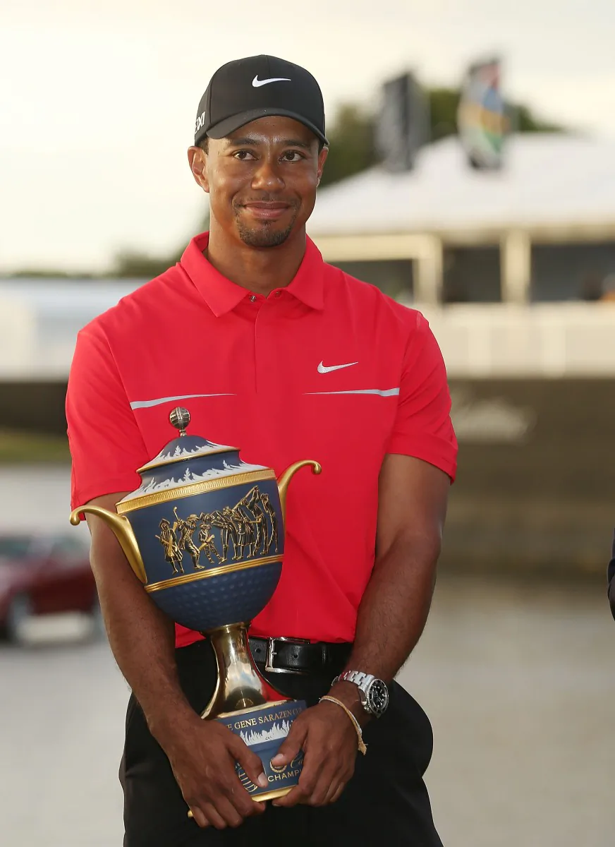 Tiger Woods poses with the Gene Sarazen Cup after his two-stroke victory at the World Golf Championships-Cadillac Championship at the Trump Doral Golf Resort & Spa on March 10, 2013, in Doral, Florida. (Warren Little/Getty Images)