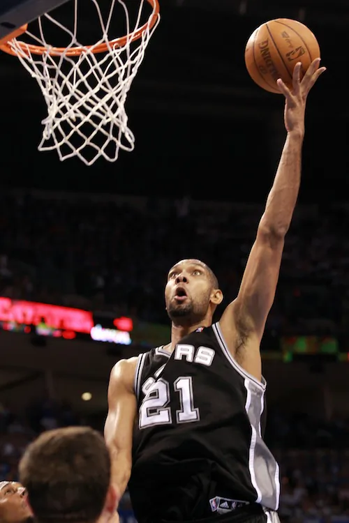 Tim Duncan will sign a new three-year deal with the Spurs. (Ronald Martinez/Getty Images)