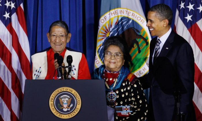 Mary Kim Titla (L) of the San Carlos Apache Tribe is shown with Lynn Valbuena (C), Chairwoman of the Tribal Alliance of Sovereign Indian Nations, and her husband Stephen Valbuena at the Senate hearing for the Committee on Indian Affairs in Washington, D.C., Nov. 29 . (Shar Adams/The Epoch Times)