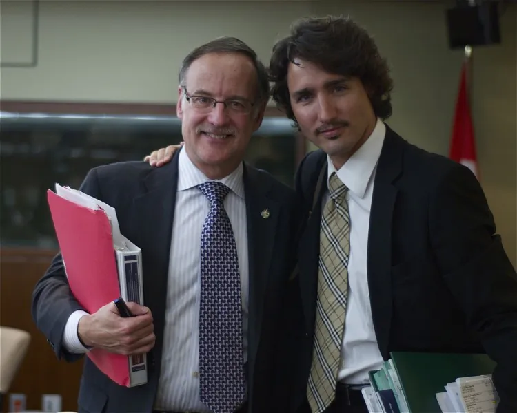 Liberal MP Justin Trudeau (R) poses with former Liberal MP Rob Oliphant in this file photo. Trudeau will face off against black belt Conservative Senator Patrick Brazeau on March 31 in a boxing match to raise money for cancer. (Matthew Little/The Epoch Times)