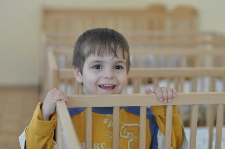 An orphan is seen in one of the over 300 orphanages in Ukraine. NGO's are helping disadvantaged families to prevent their children from being sent to orphanages. (Courtesy Partnership 4 Every Child)