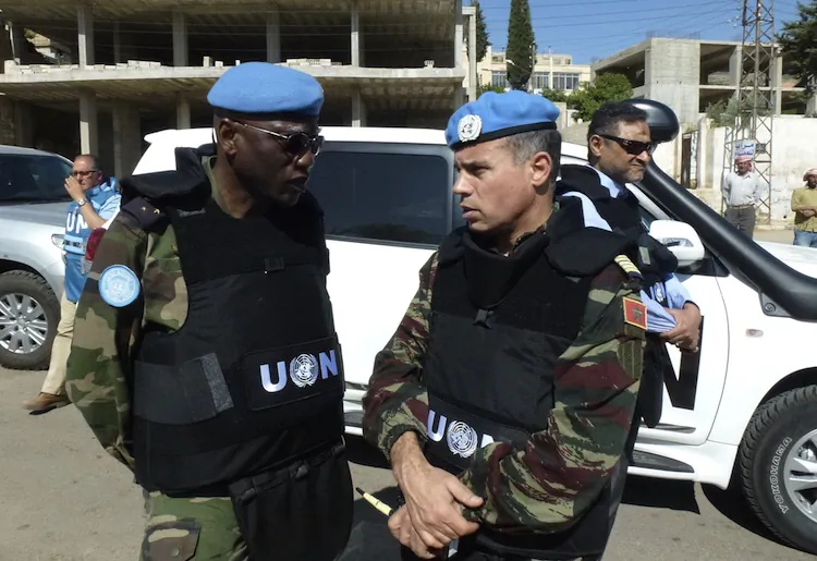 Moroccan Colonel Ahmed Himmiche, head of the UN observers' advance team (R) speaks with Senegalese Lieutenant-General Babacar Gaye, military adviser of the UN secretary general (L) in Zabadani, northwest Damascus on May 20. (-/AFP/GettyImages)