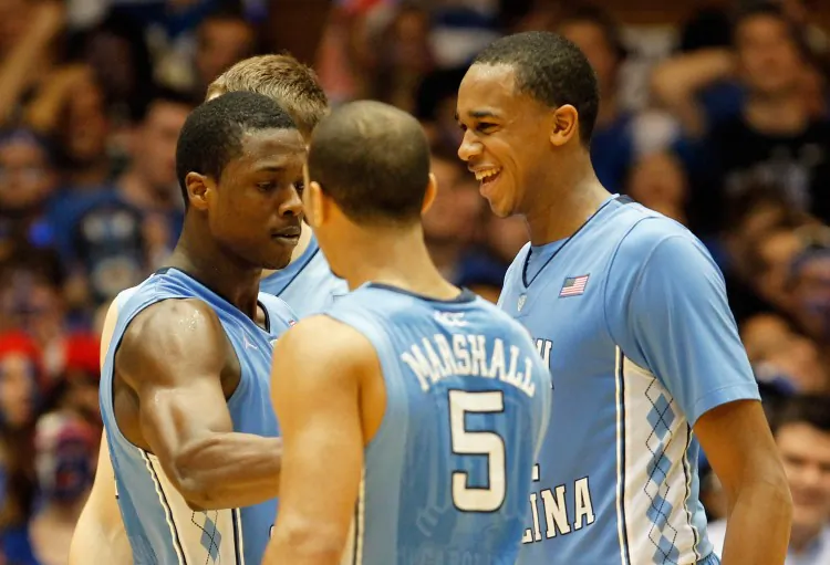 North Carolina's trio of Harrison Barnes (L), Kendall Marshall (C), and John Henson (R) led the program to 61 wins over the last two seasons. (Streeter Lecka/Getty Images)