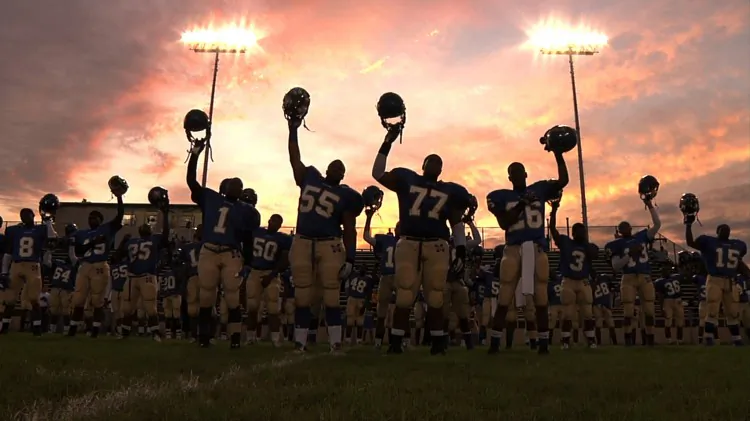 Coach Bill Courtney (center) and O.C. Brown (R) in “Undefeated,” a documentary on an underdog football team who seek to reverse their fortunes. (Dan Lindsay & TJ Martin/ The Weinstein Company)
