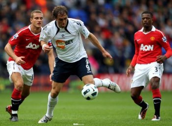 DEFENSIVE ISSUES: Bolton's Johan Elmander gets by Manchester United's porous defense. (Alex Livesey/Getty Images)