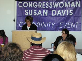 Congresswoman Susan Davis (behind podium) said, 'We do see a movement to create green jobs here in San Diego.' Irene Stillings, one of the panelists (front right), runs the California Center for Sustainable Energy. (Gisela Sommer/The Epoch Times)