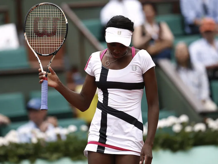 Venus Williams was bounced in her first Grand Slam appearance of 2012. (Kenzo Tribouillard/AFP/GettyImages)