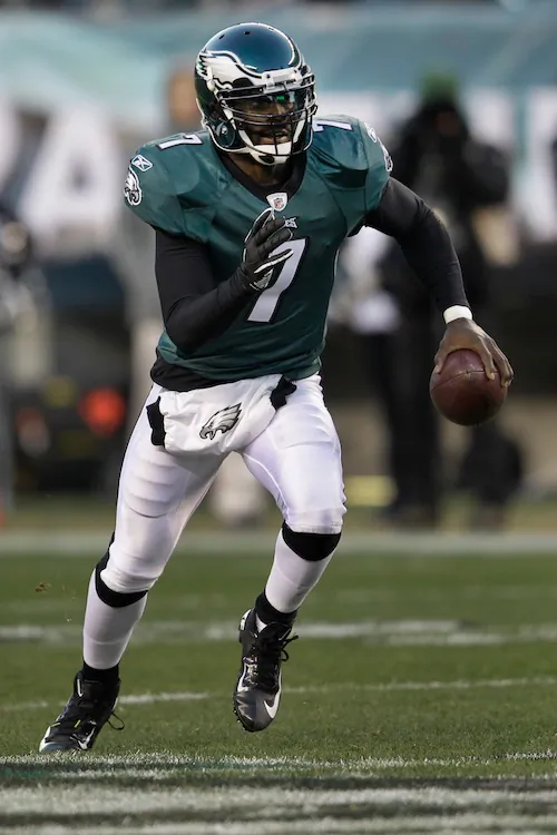 Michael Vick ran for 32 yards and a score against the Jets. (Rob Carr/Getty Images)