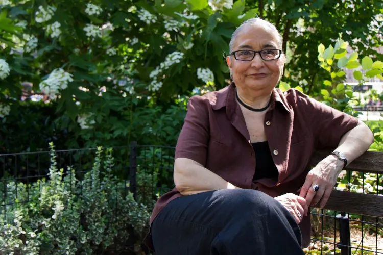Miriam Berman in front of the fountain at the South end of Madison Square Park on May 31, 2012. As detailed in Berman's book, the fountain was recreated to look exactly like the fountain in front of the original Madison Square Garden. (Benjamin Chasteen/The Epoch Times)