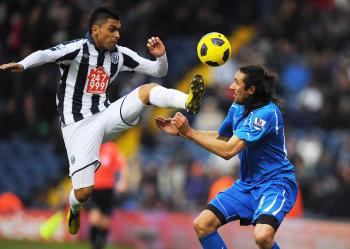 West Brom's Gonzalo Jara takes no prisoners against Newcastle's Jonas Gutierrez. (Clive Mason/Getty Images) West Brom's Gonzalo Jara takes no prisoners against Newcastle's Jonas Gutierrez. (Clive Mason/Getty Images)