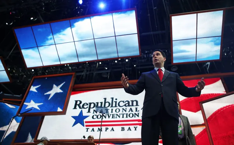 Wisconsin Gov. Scott Walker speaks on stage Aug. 26 in Tampa, Fla., ahead of the Republican National Convention at the Tampa Bay Times Forum. The RNC is scheduled to convene Monday and will hold its first full-day session Tuesday as Tropical Storm Isaac threatens disruptions due to its proximity to the Florida peninsula. (Chip Somodevilla/Getty Images)