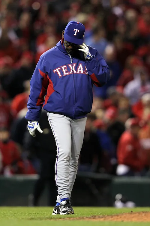 Ron Washington is a combined 427-383 in five seasons with Texas. (Jamie Squire/Getty Images)