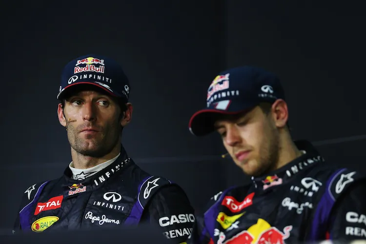 Mark Webber (L) leads his teammate Sebastian Vettel during the Formula One Malaysian Grand Prix in Sepang on March 24, 2013. (Philippe Lopez/AFP/Getty Images)