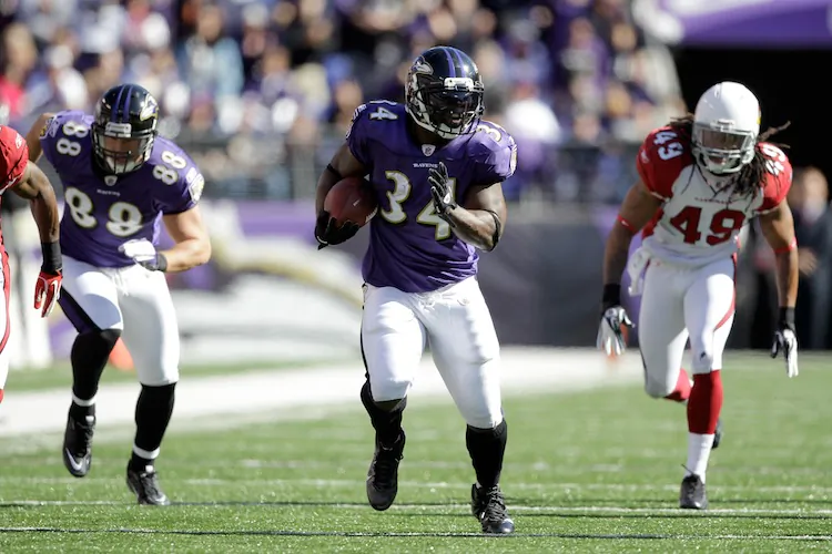 Williams (center) ran for 444 yards in 2011. (Rob Carr/Getty Images)