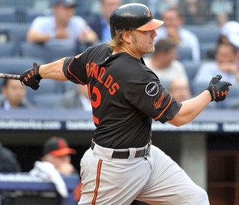 Mark Reynolds' made enough contact to drive in the game winning run with his clutch single in the 11th. The first baseman had gone hitless in his previous five at-bats, including four by strikeout before the game-altering breakthrough. (Christopher Pasatiri/Getty Images)