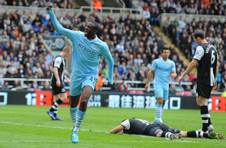 Manchester City’s Yaya Toure celebrates his second goal in beating Newcastle. (Andrew Yates/AFP/GettyImages)