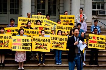 PROTEST: One of the speakers at a rally against John Liu, a candidate for NYC comptroller. (Matthew Robertson/The Epoch Times)