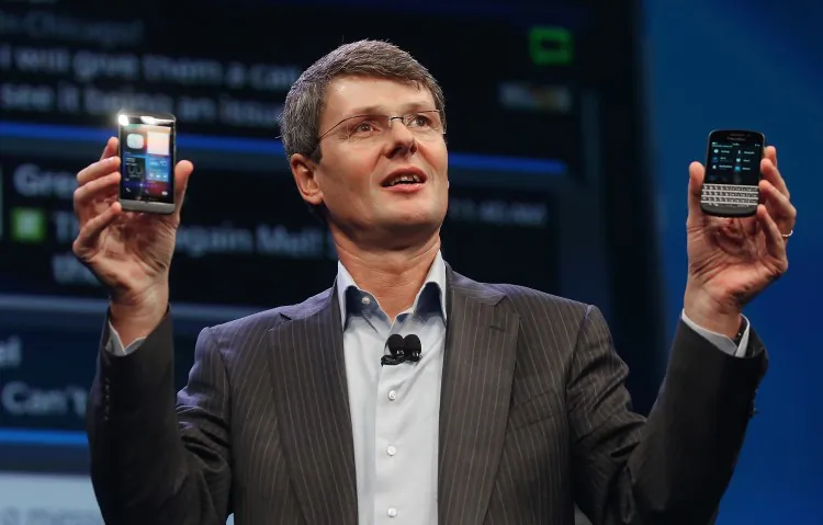 Minister of International Trade and Minister for the Asia-Pacific Gateway Ed Fast (L), BlackBerry (formerly RIM) president and CEO Thorsten Heins, and Foreign Affairs Minister John Baird (R) mark the launch of the new BlackBerry 10 smartphone during the World Economic Forum annual meeting in Davos, Switzerland, in advance of the worldwide launch on Jan. 30, 2013. (DFAIT)