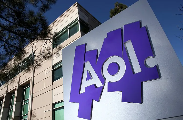 The AOL Inc. logo is displayed in front of its offices in Palo Alto, Calif., in February 2011. On Monday, AOL said it is selling 800 technology patents to Microsoft Corp. for $1 billion in cash. (Justin Sullivan/Getty Images)