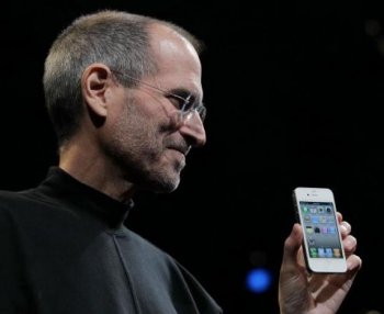 Apple CEO Steve Jobs holds the new iPhone 4, with integrated gyroscope, after he delivered the opening keynote address at the 2010 Apple World Wide Developers conference June 7, in San Francisco. (Justin Sullivan/Getty Images)