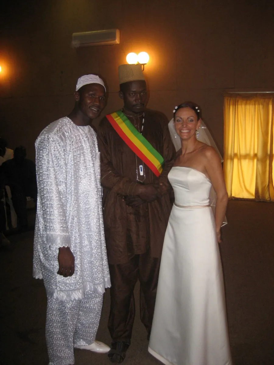 Lainie Towell and Fodé Mohamed Soumah (L) on their wedding day in Guinea, West Africa, in 2007. Towell’s efforts to bring attention to her own case of marriage fraud may have contributed to tighter laws currently being introduced by the government to deter marriages of convenience. (Courtesy of Lainie Towell)