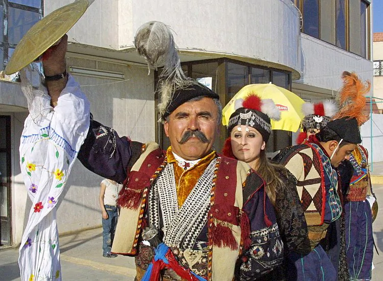 File photo of Iraqi Assyrians in Damascus, Syria, wearing traditional dress to celebrate New Year’s. Assyrians fear they will be subject to persecution should the Assad regime to fall in Syria, says Rima Haro, an Assyrian and Middle East expert living in Sweden. (Louai Beshara /AFP/Getty Images)