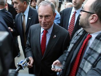 New York City Mayor Michael Bloomberg (C) leaves City Hall following a contentious vote on term limits October 23, 2008 in New York City.   (Spencer Platt/Getty Images)