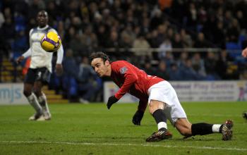 THE WINNER: Dimitar Berbatov secures the three points for United in England's Monday night football. (Alex Livesey/Getty Images)