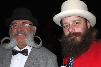 Bill Mitchell from Georgia (L) won best-in-show after winning in the freestyle category at the Brooklyn Beard and Moustache Competition on Saturday. The runner-up (R) won in the recession beard category. (Tara MacIssac/The Epoch Times) Bill Mitchell from Georgia (L) won best-in-show after winning in the freestyle category at the Brooklyn Beard and Moustache Competition on Saturday. The runner-up (R) won in the recession beard category. (Tara MacIssac/The Epoch Times)