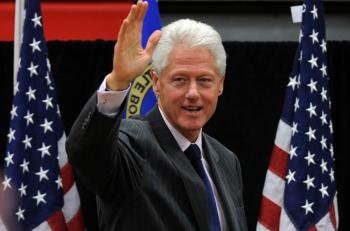 Bill Clinton arrives to endorse Nevada Senator Harry Reid during a pre-Early Vote campaign rally at Valley High School in Las Vegas on October 12, 2010. (Mark Ralston/AFP/Getty Images)