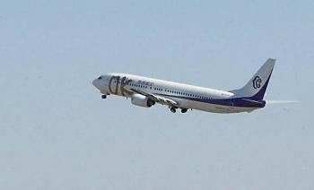 Okay Airways' Boeing 737-900 on a flight in 2005. (STR/AFP/Getty Images)