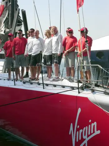 BON VOYAGE: Virgin Group chairman Sir Richard Branson with part of the TeamOrigin sailing crew on board the 99-foot yacht they will sail from New York to England in an attempt to break the world record for fastest crossing of the Atlantic on a boat. (Christine Lin The Epoch Times)